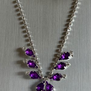 Purple Point rhinestone set. 16” chain. Earrings 1” long